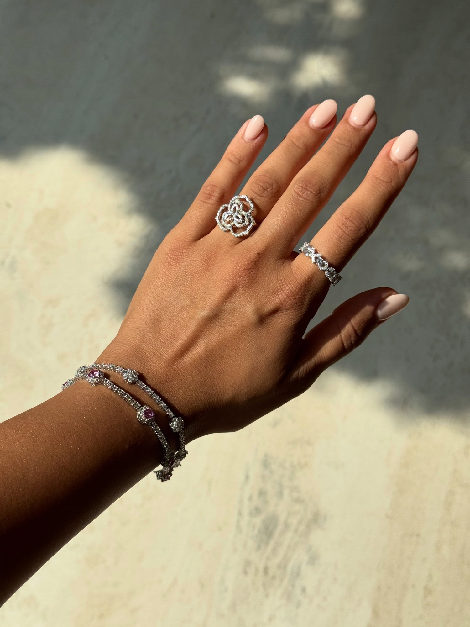 Floral jewelry styling from Suzy Levian's July 28 Instagram carousel