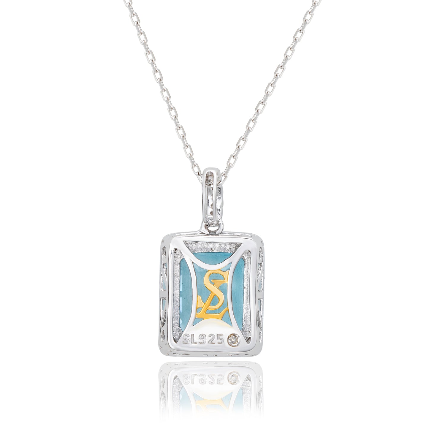 Suzy Levian Sterling Silver Emerald Cut Blue Topaz And White Topaz Pendant