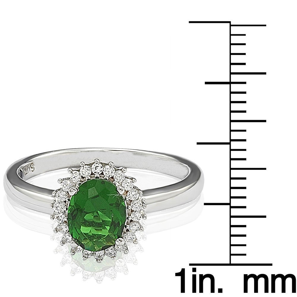 Suzy Levian Sterling Silver Simulated Green Emerald Oval Cubic Zirconia Halo Ring