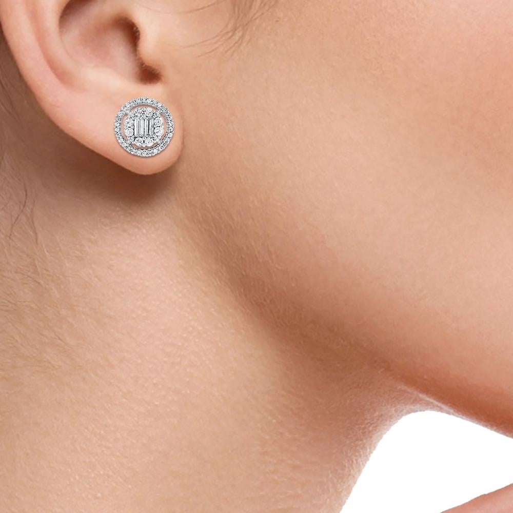Close-up of a woman's earlobe wearing a sparkling round halo stud earring, illustrating on-ear size and placement