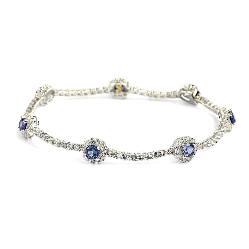 Sterling silver sapphire and diamond accent flower tennis bracelet