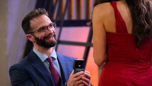 John proposing to Sarah with an engagement ring during the Love Is Blind Season 11 reveal in Boston