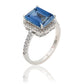 Suzy Levian Sterling Silver Large Emerald-Cut Blue and White Cubic Zirconia Halo Ring