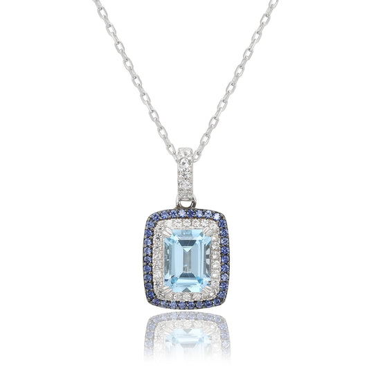 Suzy Levian Sterling Silver Emerald Cut Blue Topaz And Sapphire Accent Pendant
