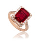 Suzy Levian Rose Sterling Silver Large Emerald-Cut Red Cubic Zirconia and Baguette White Cubic Zirconia Halo Ring