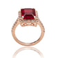 Suzy Levian Rose Sterling Silver Large Emerald-Cut Red Cubic Zirconia and Baguette White Cubic Zirconia Halo Ring