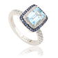 Suzy Levian Sterling Silver Emerald Cut Blue Topaz and Sapphire Accent Ring