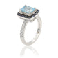 Suzy Levian Sterling Silver Emerald Cut Blue Topaz and Sapphire Accent Ring