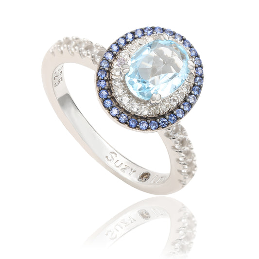 Suzy Levian Sterling Silver Oval Cut Blue Topaz and Sapphire Accent Ring